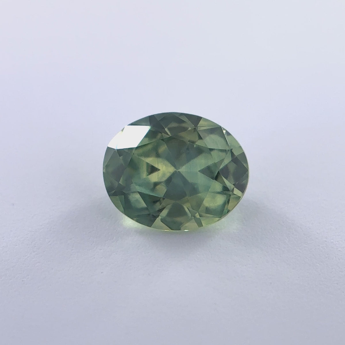 .35ct Green Oval Cut Montana Sapphire 5.5mm x 4.5mm x 2.5mm