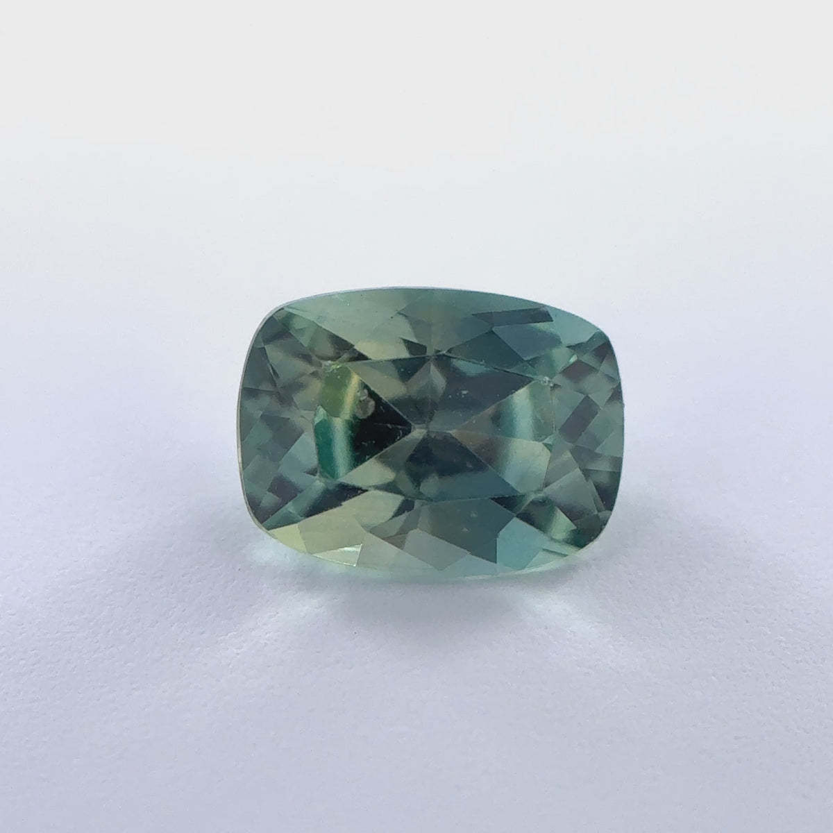 .68ct Parti-Color Cushion Cut Montana Sapphire 6mm x 4mm x 3mm