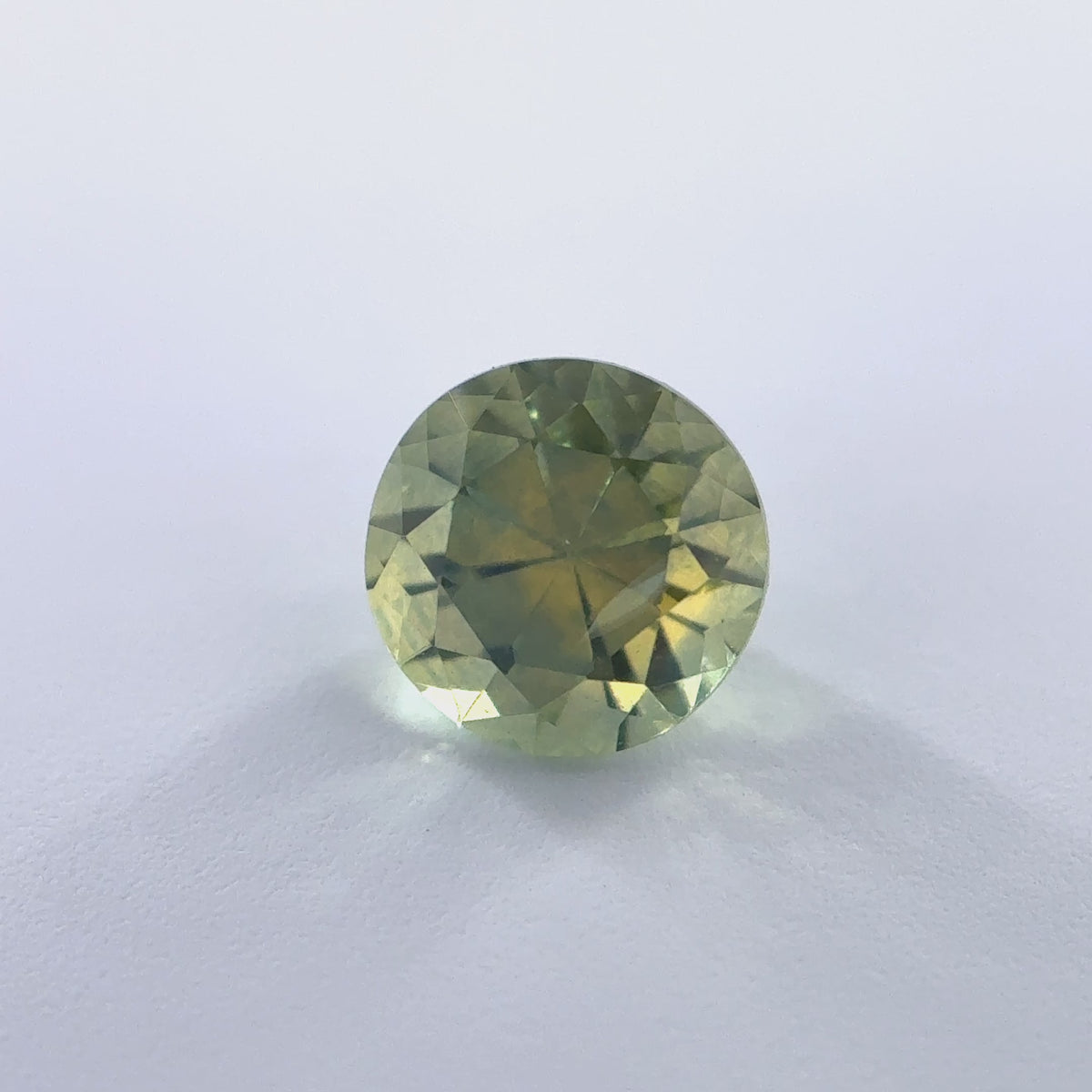 .60ct Parti-Color Round Cut Montana Sapphire 4.5mm x 3.5mm