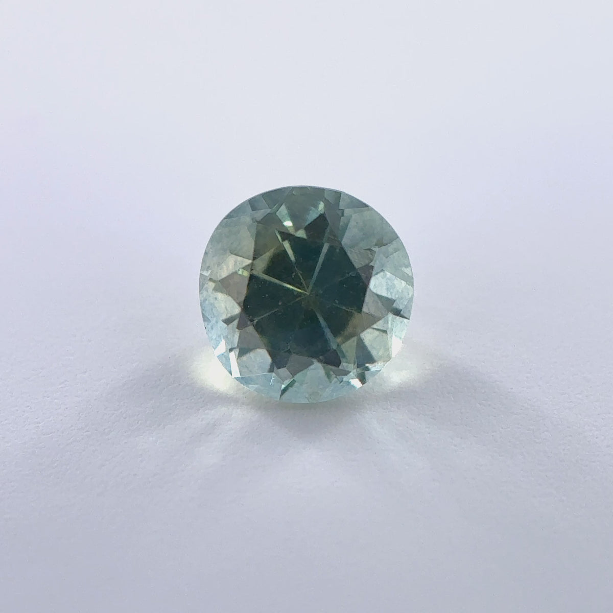 .53ct Parti-Color Round Cut Montana Sapphire 4.5mm x 3mm