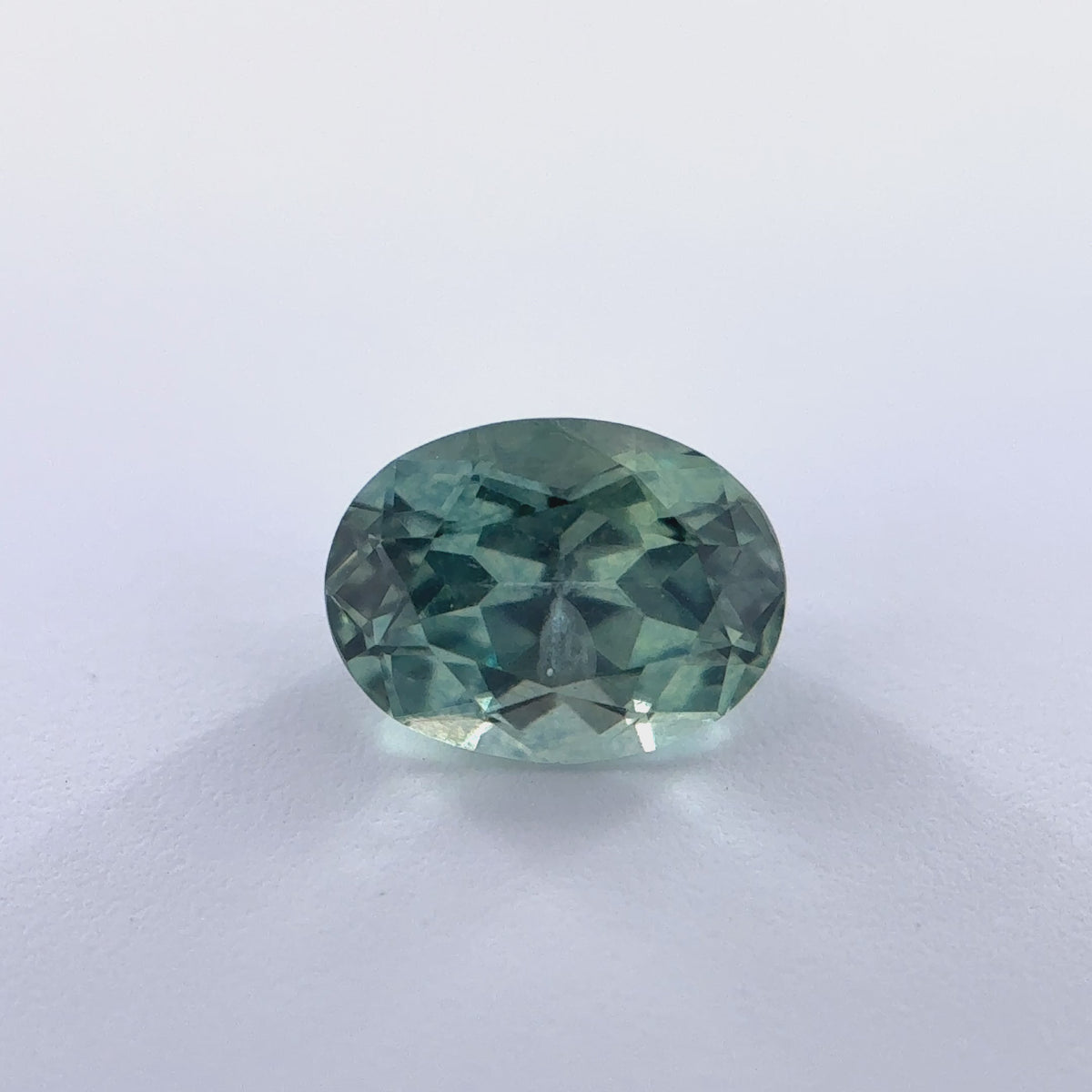 .57ct Green Oval Cut Montana Sapphire 5.5mm x 4mm x 3mm