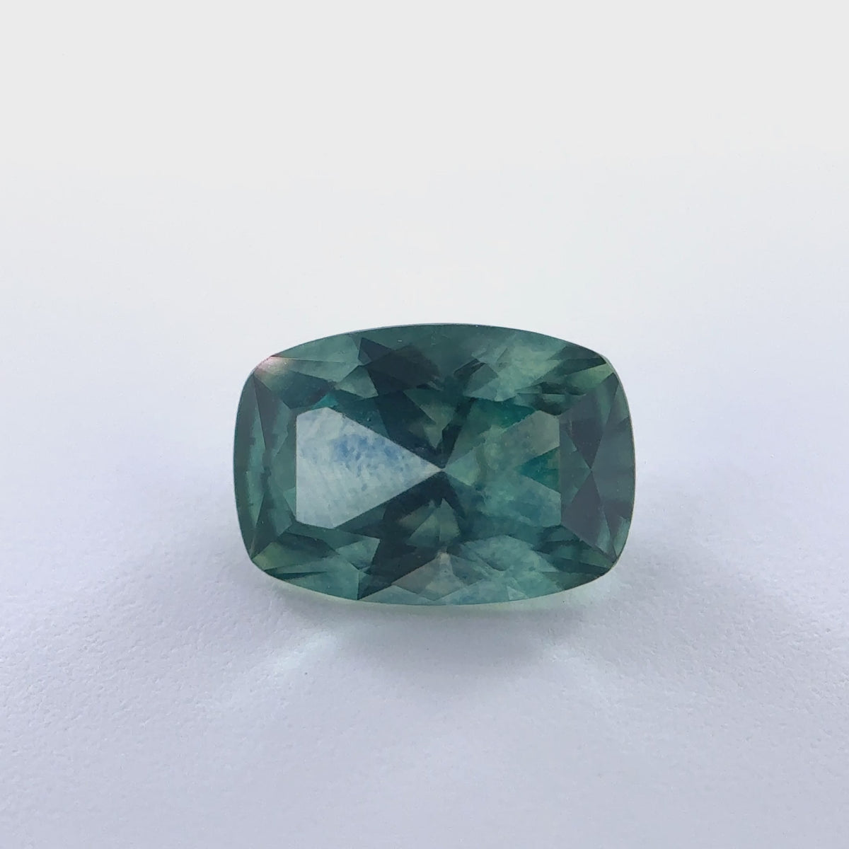 .68ct Teal Elongated-Cushion Cut Montana Sapphire 6.13mm x 4.26mm x 3.03mm