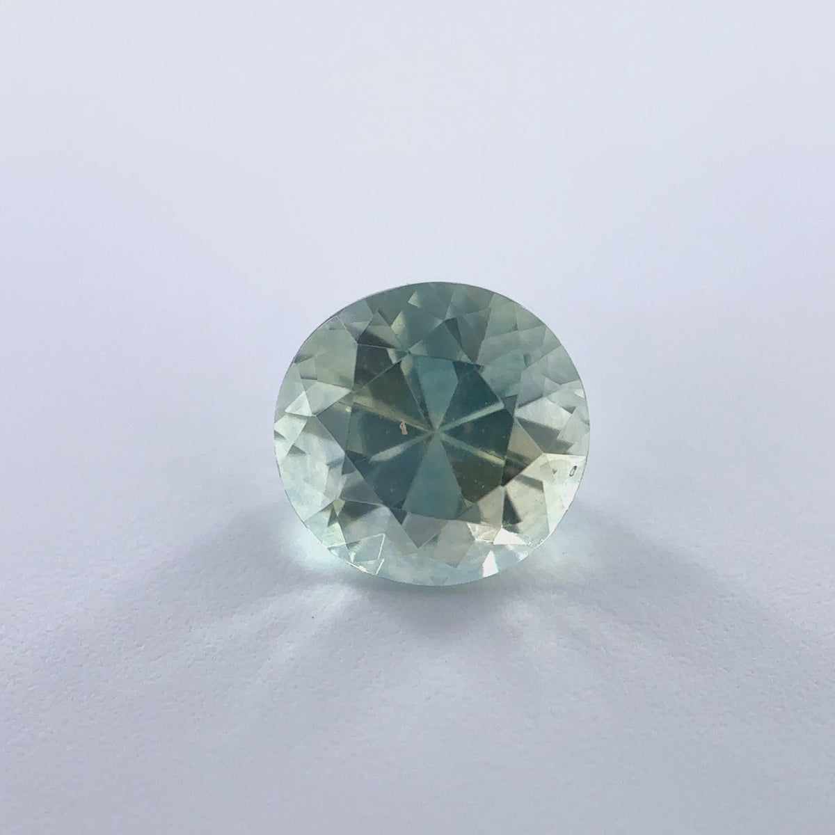 .68ct Parti-Color Round Cut Montana Sapphire 4.5mm x 3.5mm