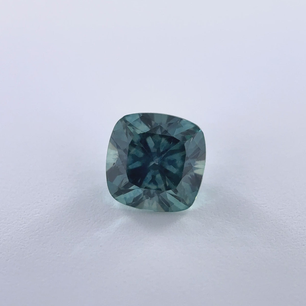 .33ct Teal Cushion Cut Montana Sapphire 3.96mm x 3.39mm x 2.58mm